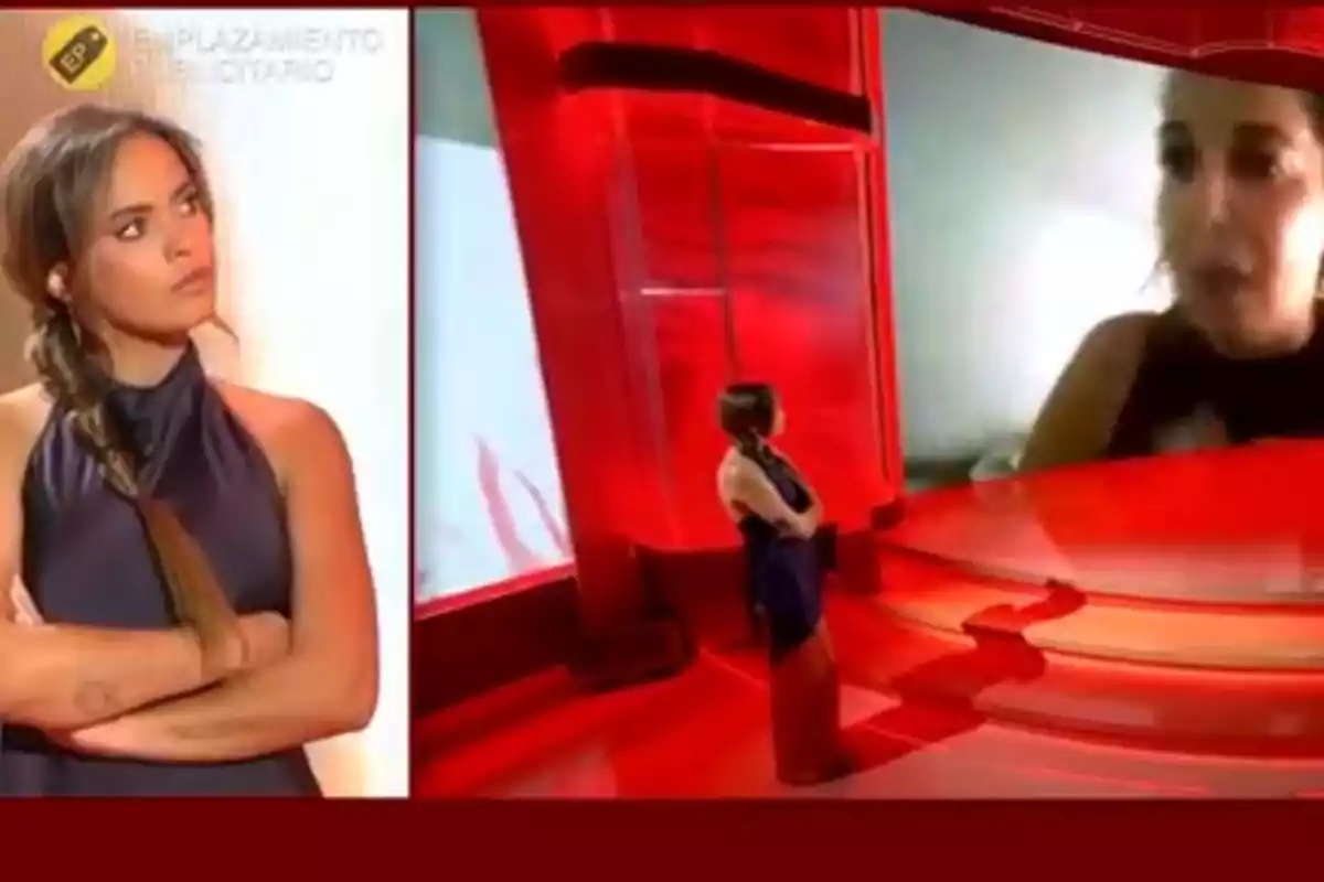 Gloria Camila de cabello largo con trenza y vestido oscuro aparece dos veces en un set de televisión rojo, una en primer plano y otra de espaldas mirando una pantalla gigante donde se proyecta el rostro de otra persona Gloria Camila de cabello largo con trenza y vestido oscuro aparece dos veces en un set de televisión rojo, una en primer plano y otra de espaldas mirando una pantalla gigante donde se proyecta el rostro de otra persona